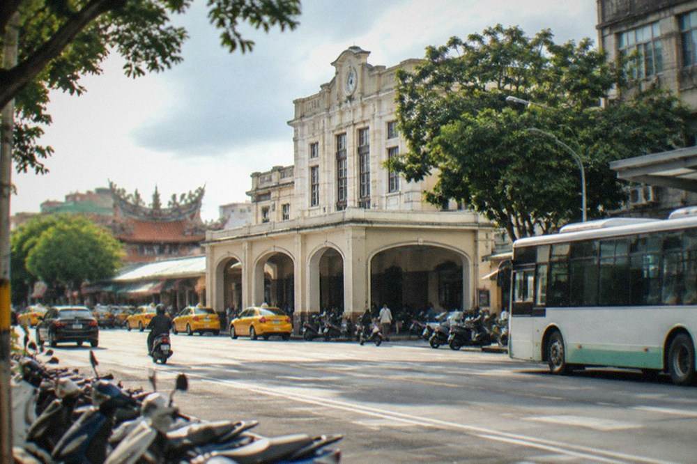 A Tainan city bus at a roadside stop in the afternoon