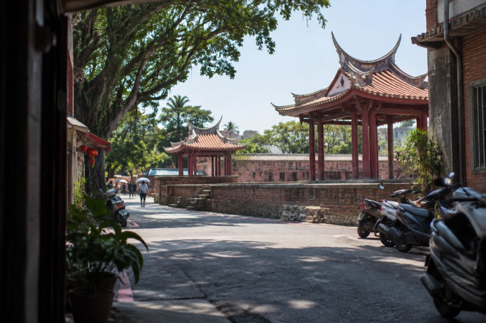 Historic red brick walls and a Chinese pavilion at a Tainan heritage site
