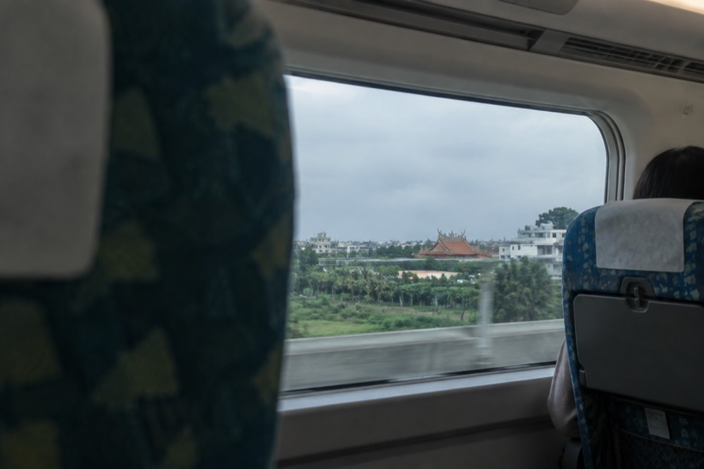 Interior of a modern high speed rail train with rows of seats